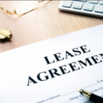 A legal document with the text of a lease agreement written in black ink on white paper.