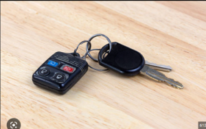 A set of keys lying on a countertop.