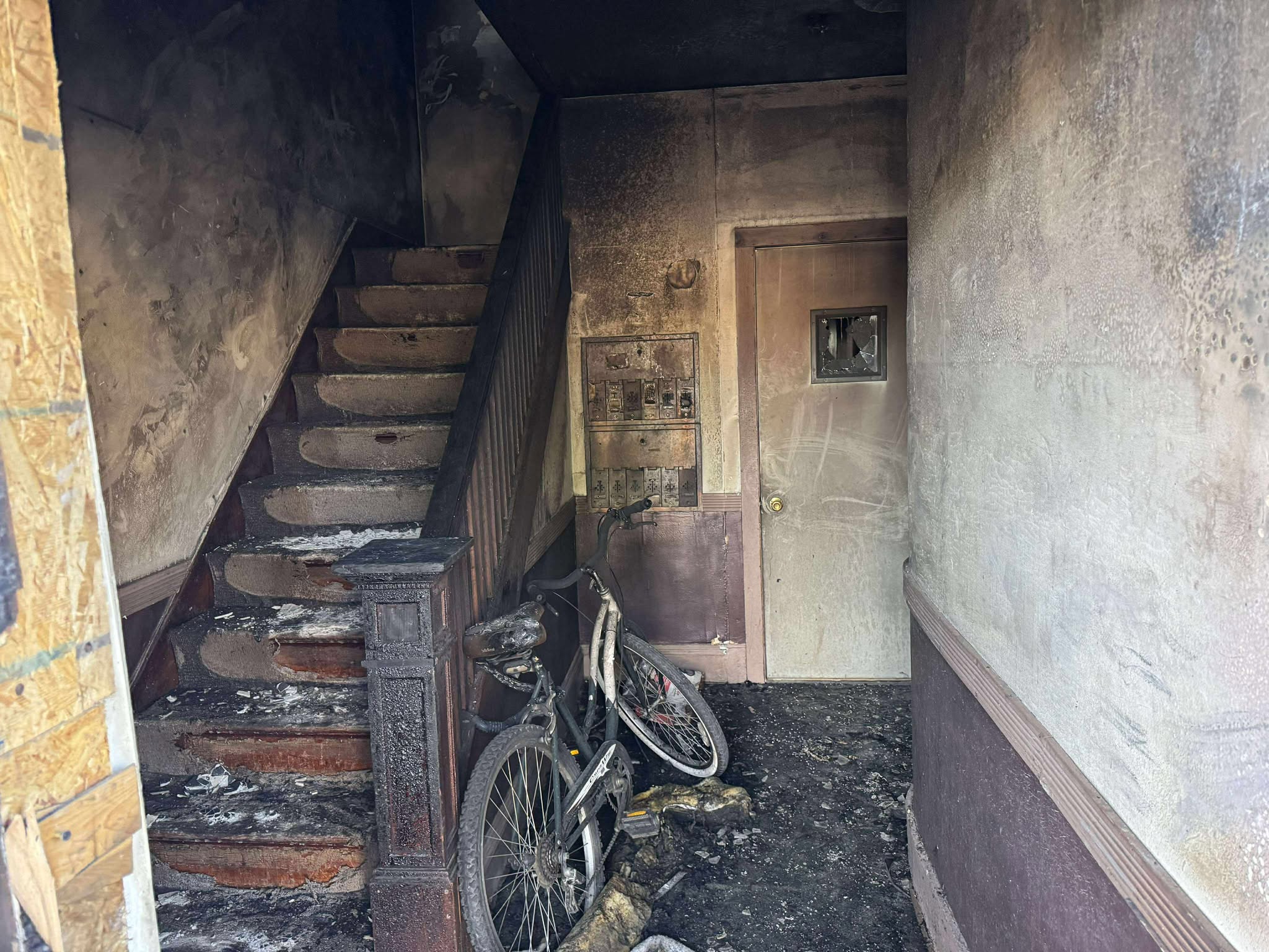 Fire damage stairwell hallway Renpro property Syracuse NY
