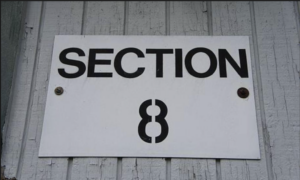 Section 8 sign on building