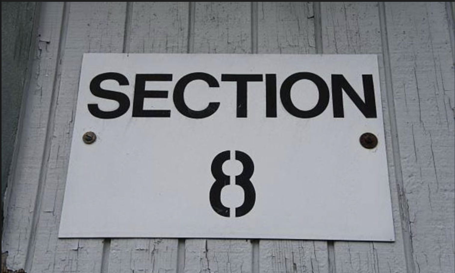 Section 8 sign on building